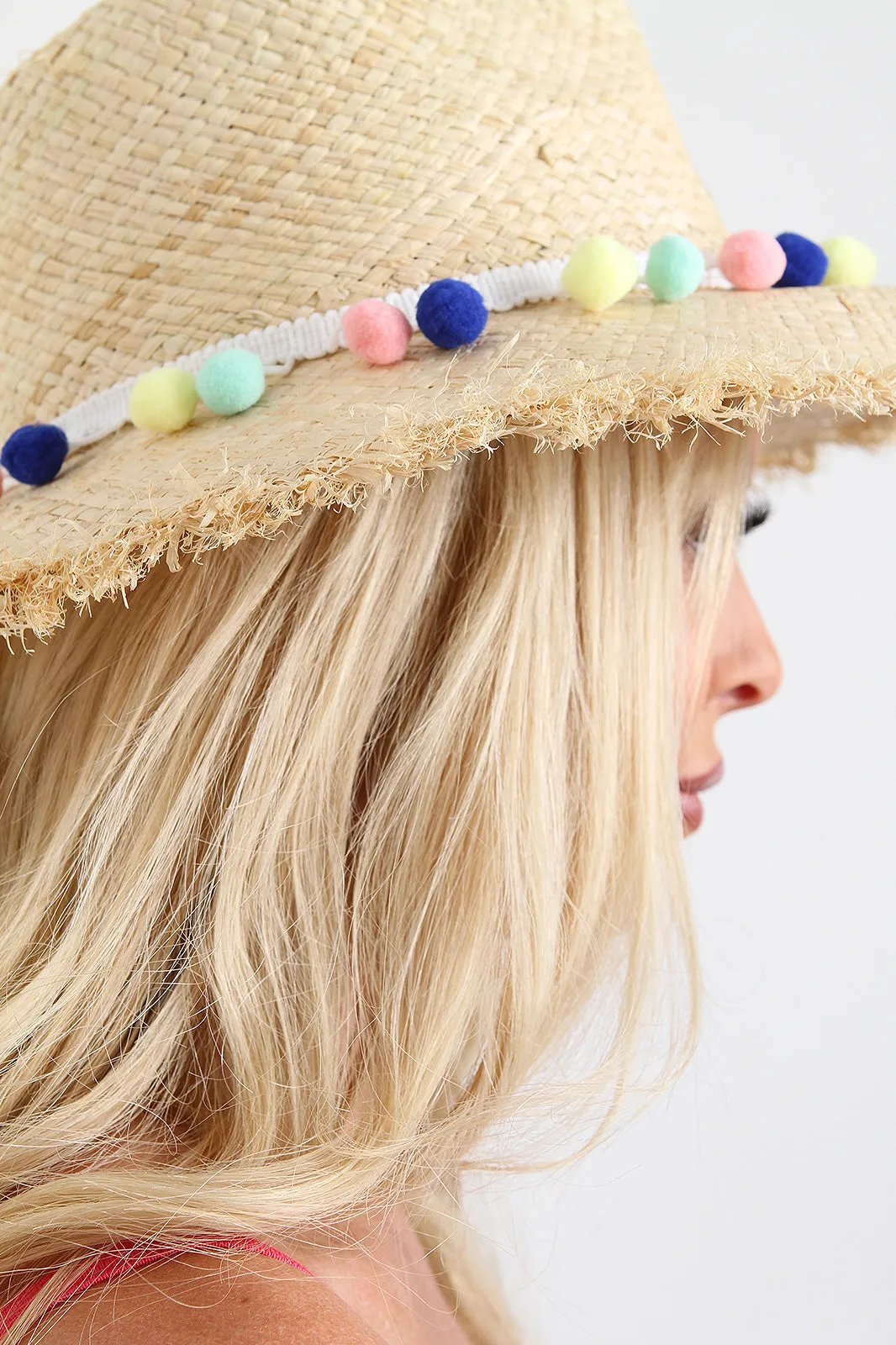 Dangly Pom Pom Frayed Straw Hat